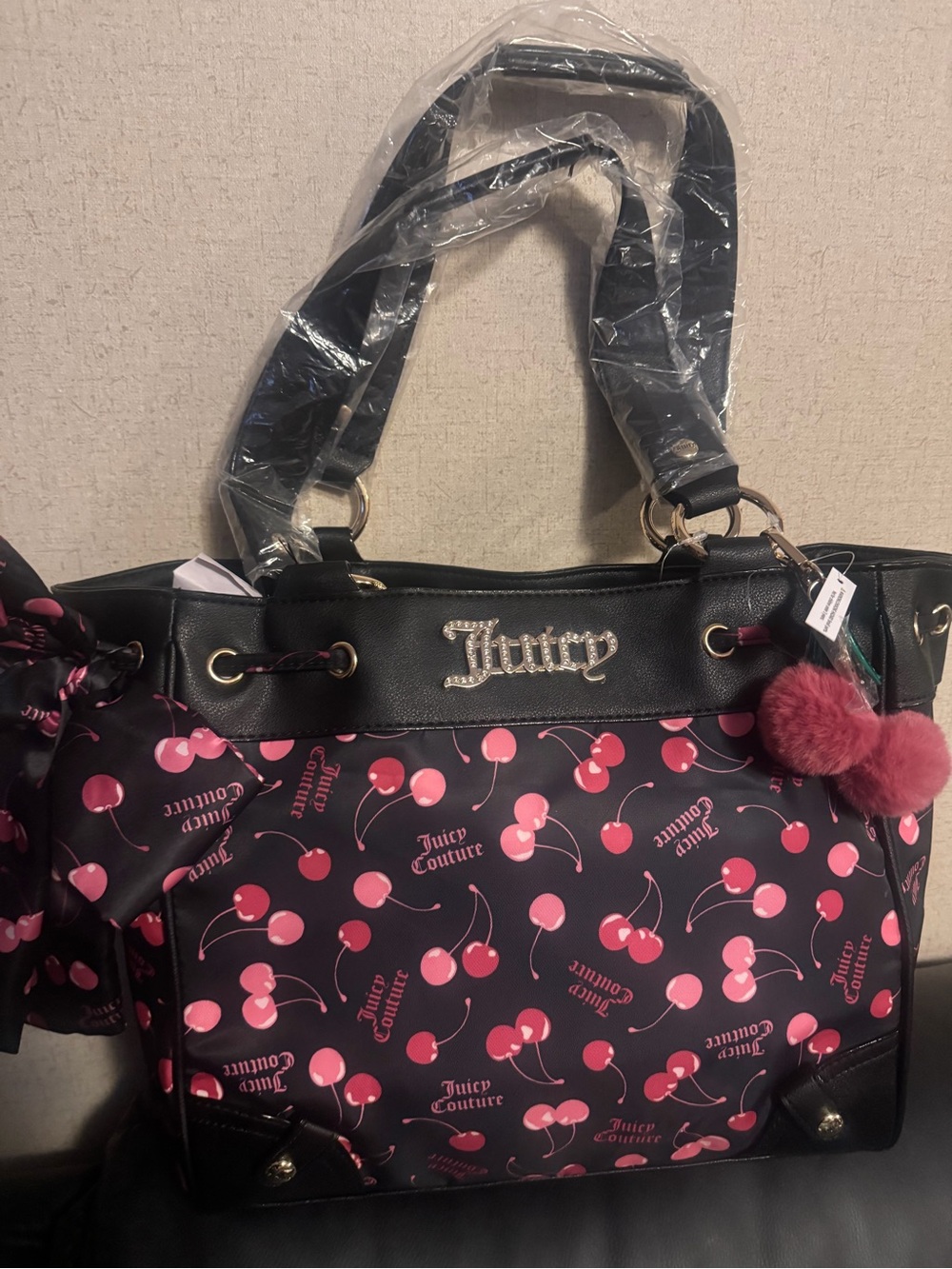 Juicy Couture Black Tote with Pink Cherry Print and Pom-Pom Charm